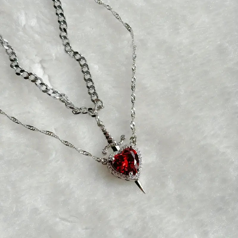 COLLAR CORAZON ESPADA