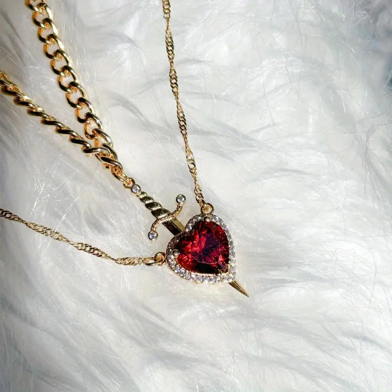 COLLAR CORAZON ESPADA